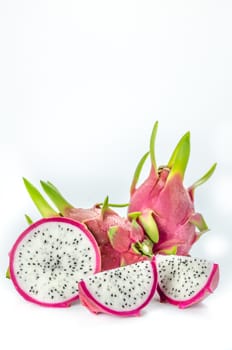 Ripe Dragon fruit or Pitaya with slice on white background