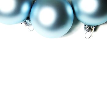 Blue christmas balls on white background