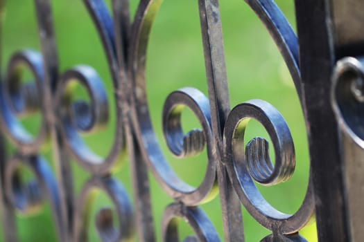 Metal old black fence detail close up photo