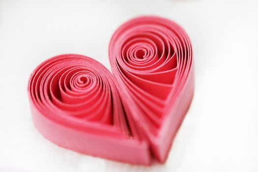Quilling handmade heart. Made of paper heart in quilling style with selective focus
