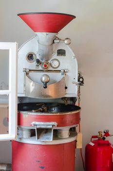 Old red coffee roaster gas operations.