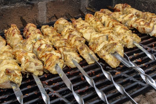 a Shashlik on skewers closeup on grill