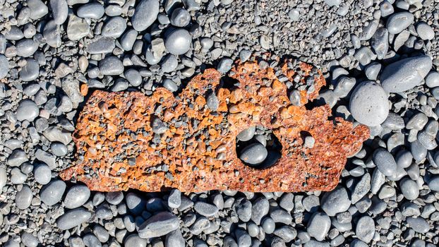 Remains of a boat wreck at the black beach on Iceland Snaefellsnes Dritvik - Selective focus