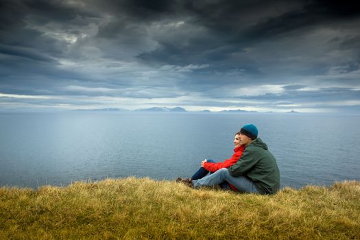 A couple contemplating the beautiful landscape