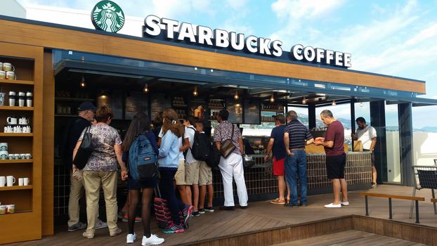 Monte-Carlo, Monaco - September 26, 2016: Customer Line Up For Buying Coffee, Cakes Or Frappuccino At Starbucks In Monaco, French Riviera