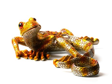 Bright statuette of the lizard isolated on white background