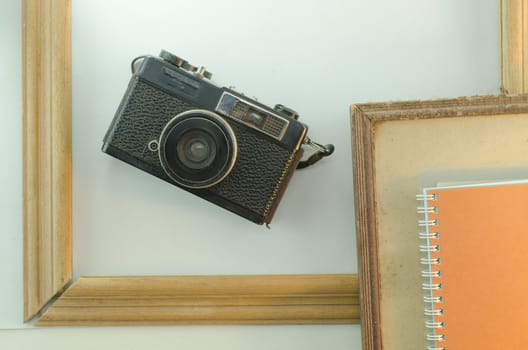Memoirs, diaries, cameras, old frame white background notebook