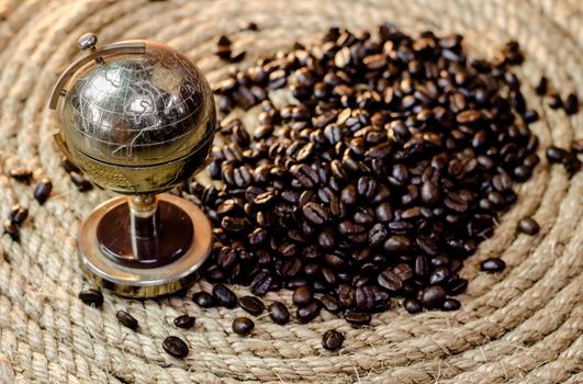 Golden Globes with coffee beans on a jute rope