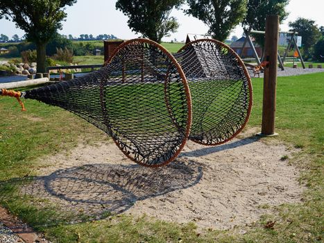 Fun time with creative play net in a playground