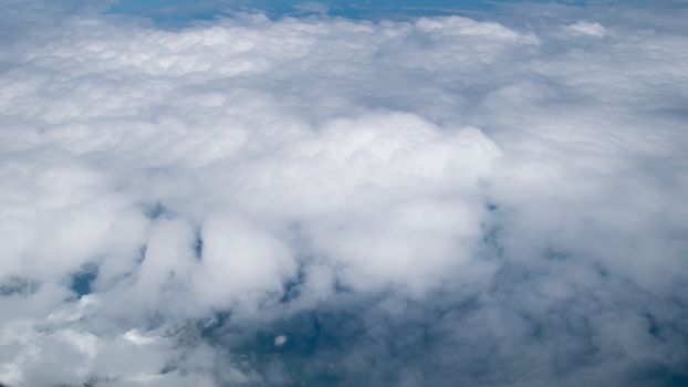 The beautiful cloudy and blue sky (view from airplane).