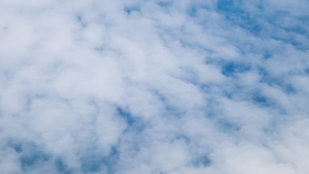 The beautiful cloudy and blue sky (view from airplane).