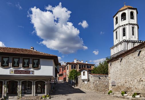 A view of one of the main streets in old town of Plovdiv, Bulgaria with the dome of St. St. Constantine and Helena church