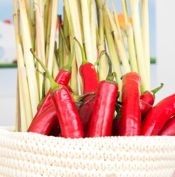 the peppers in a wicker basket close-up