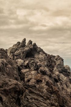 volcanic cliffs on cloud day