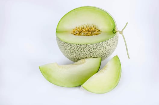 shopped green melon isolated on white background