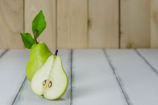 Fresh pears on the wooden background , Free space for text