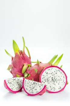 Ripe Dragon fruit or Pitaya with slice on white background