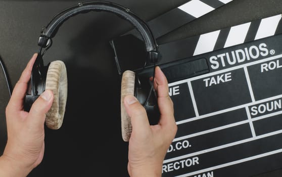 Handle headphone on a slate black background