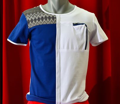 picture of a fashion summer clothes on a manequin doll on a red background