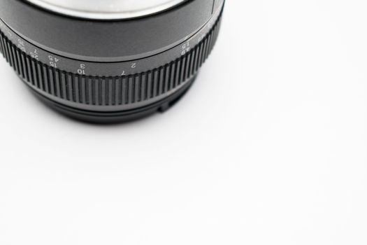 A photographic lens close up background on a white background