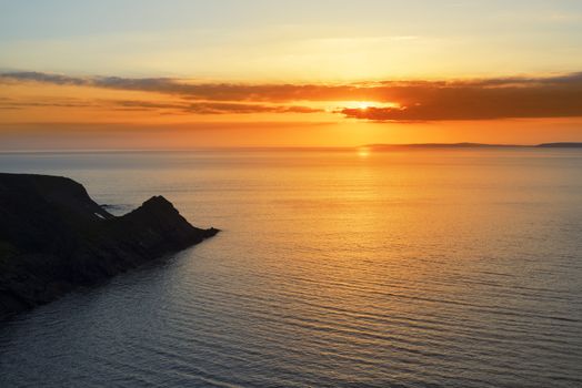 beautiful serene sunset over loop head with the ballybunion coast on the wild atlantic way in ireland