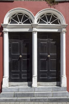 two arched georgian doors in kilkenny city ireland