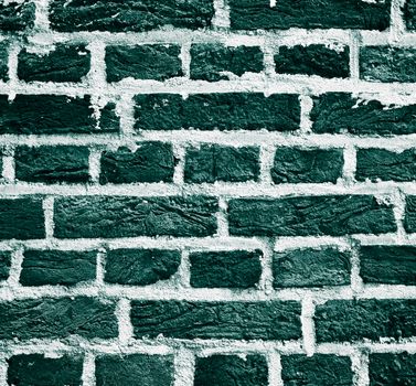 Background of Old Turquoise  Brick Wall with Cracked Concrete  closeup Outdoors