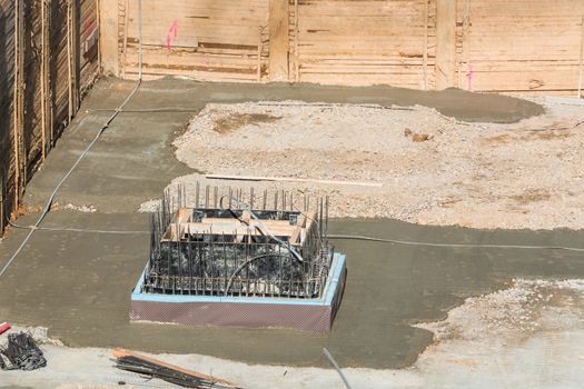 Foundation building of steel and concrete for the construction of an apartment building with underground parking.