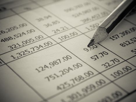 closeup summary report with pencil. selective focus.