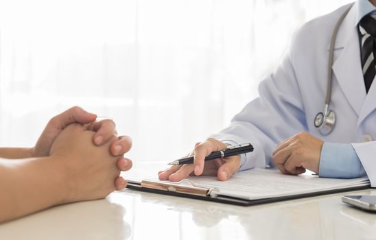 Doctors are recording information the patient's illness.