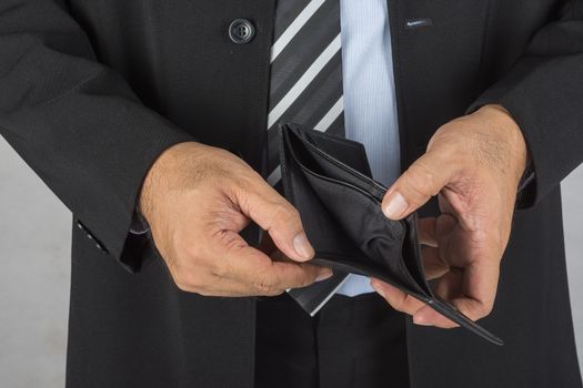businessman showing an empty wallet no money.  bankrupt concept, finances concept,