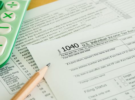 individual income tax return form on desk
