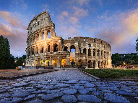 View of Colosseum in Rome and morning sun, Italy, Europe.