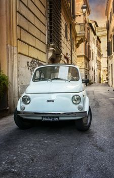 ROME - MAY 27: Fiat 500 parked on May 27, 2016 in Rome. Fiat 500 was one of the most produced European cars ever with 3,893,294 units manufactured in years 1957-1975.