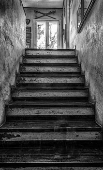Creepy house stairs in black and white