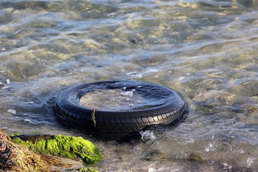 Tire Polluting The Ocean Water