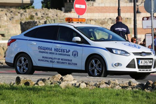 Nessebar, Bulgaria - July 16, 2016: White Ford Focus Police (Municipality Of Nessebar) Car Parked on the Street in Nessebar on the Bulgarian Black Sea Coast, Nobody in Vehicle