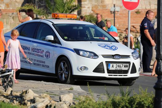 Nessebar, Bulgaria - July 16, 2016: White Ford Focus Police (Municipality Of Nessebar) Car Parked on the Street in Nessebar on the Bulgarian Black Sea Coast, Nobody in Vehicle

