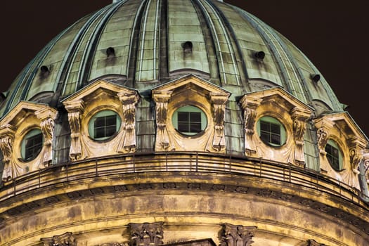 Fragment of old cathedral dome at night