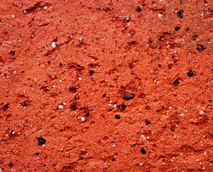 Surface of red brick in close-up as a texture. Macro photo.