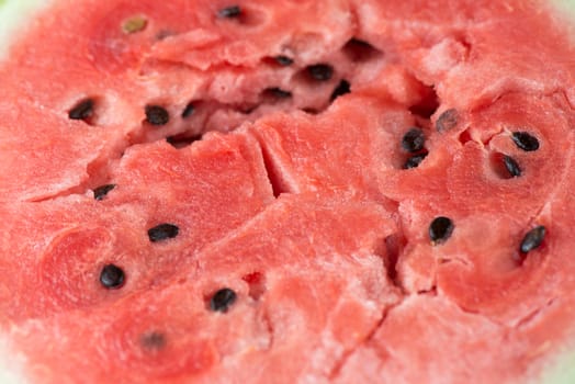 ripe watermelon flesh closeup macro texture background.