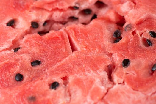 ripe watermelon flesh closeup macro texture background.