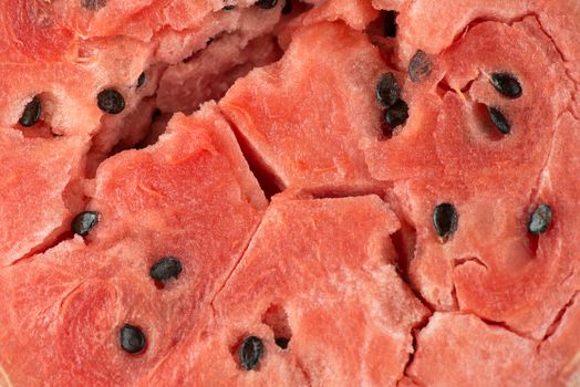 ripe watermelon flesh closeup macro texture background.