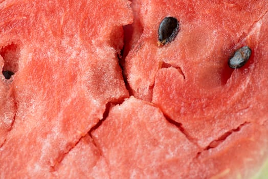 ripe watermelon flesh closeup macro texture background.