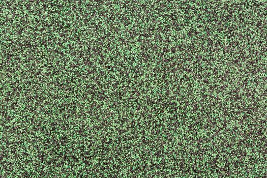 Green and Black Rubber Floor or Mat on playground.