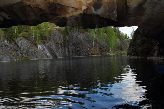 View from the cave of marble quarry in Karelia. Russia