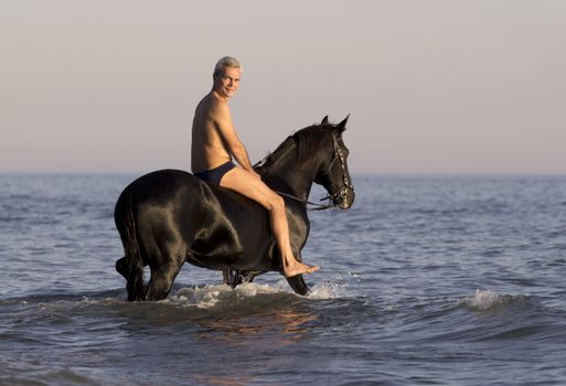 horsemanand her horse in the sea