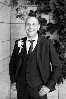 Happy man in a summer wedding day