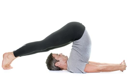 yoga man in front of white background