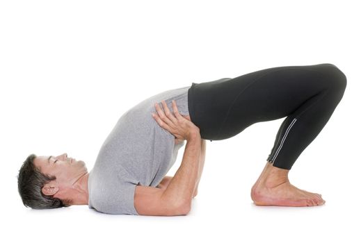 yoga man in front of white background